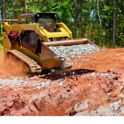 Skid Steer RentalsSkid steer carrying gravel it the bucket