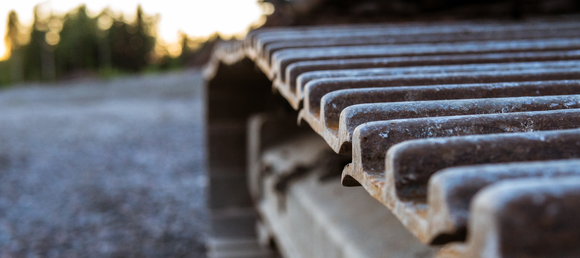 Tracks of heavy machinery